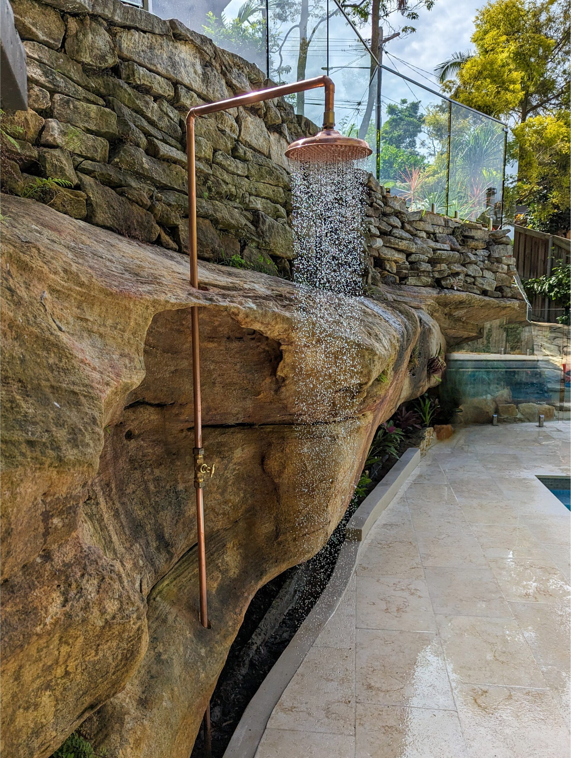 Outdoor shower beside pool area in Frenchs Forest